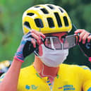 Team Education First rider Colombia's Sergio Higuita has his mask on before the first stage of the Tour de France. Picture: Kenzo Tribouillard/AFP/Getty