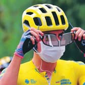Team Education First rider Colombia's Sergio Higuita has his mask on before the first stage of the Tour de France. Picture: Kenzo Tribouillard/AFP/Getty
