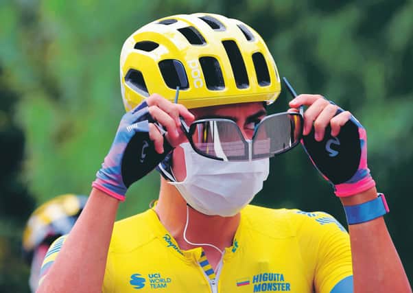 Team Education First rider Colombia's Sergio Higuita has his mask on before the first stage of the Tour de France. Picture: Kenzo Tribouillard/AFP/Getty
