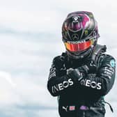 Lewis Hamilton perform the Wakanda Salute in tribute to Chadwick Boseman. Picture: AFP via Getty Images