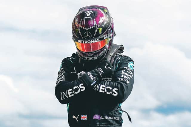 Lewis Hamilton perform the Wakanda Salute in tribute to Chadwick Boseman. Picture: AFP via Getty Images