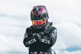 Lewis Hamilton perform the Wakanda Salute in tribute to Chadwick Boseman. Picture: AFP via Getty Images