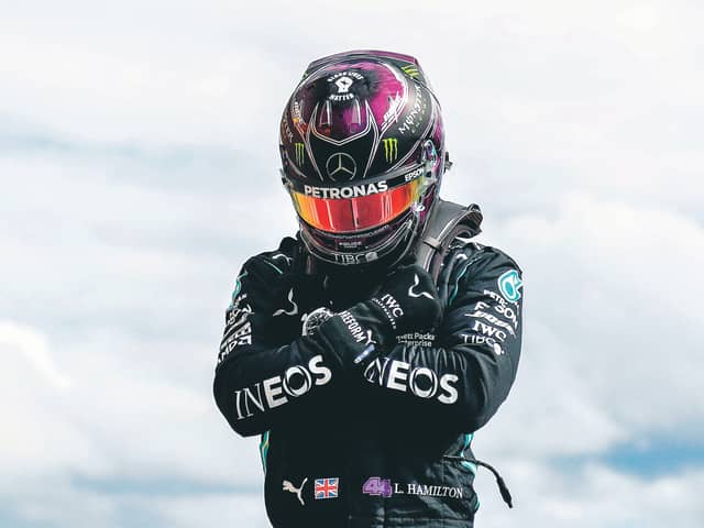 Lewis Hamilton perform the Wakanda Salute in tribute to Chadwick Boseman. Picture: AFP via Getty Images