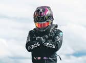 Lewis Hamilton perform the Wakanda Salute in tribute to Chadwick Boseman. Picture: AFP via Getty Images