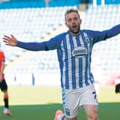 Rory McKenzie celebrates his delicious dink, the goal of the game at Rugby Park.  Photograph: Craig Foy/SNS