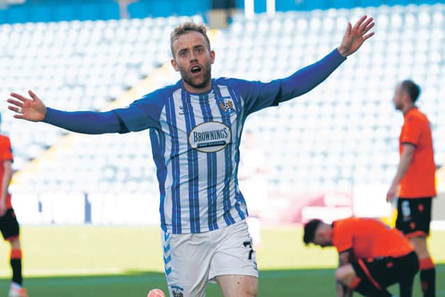 Rory McKenzie celebrates his delicious dink, the goal of the game at Rugby Park.  Photograph: Craig Foy/SNS