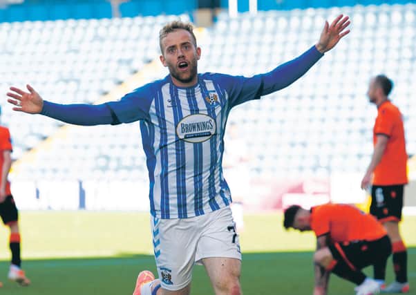 Rory McKenzie celebrates his delicious dink, the goal of the game at Rugby Park.  Photograph: Craig Foy/SNS