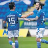 Danny McNamara (L) congratulates Stevie May on his winning goal. (Photo by Bill Murray / SNS Group)