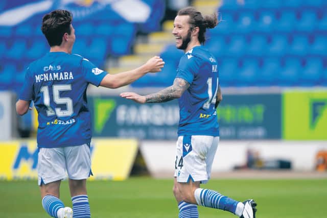 Danny McNamara (L) congratulates Stevie May on his winning goal. (Photo by Bill Murray / SNS Group)