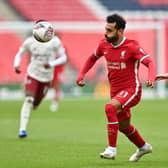 Kieran Tierney, right, vies with Liverpool's Mohamed Salah during Saturday's Community Shield showdown. Picture: Justin Tallis/pool via Getty Images