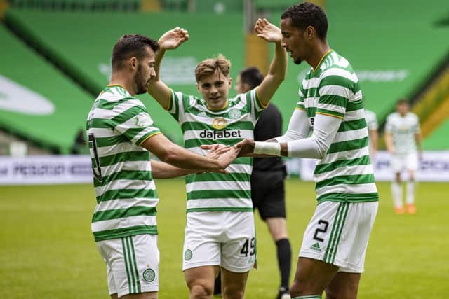Left to right, Celtic scorers Albian Ajeti, James Forrest and Christopher Jullien celebrate. Picture: SNS