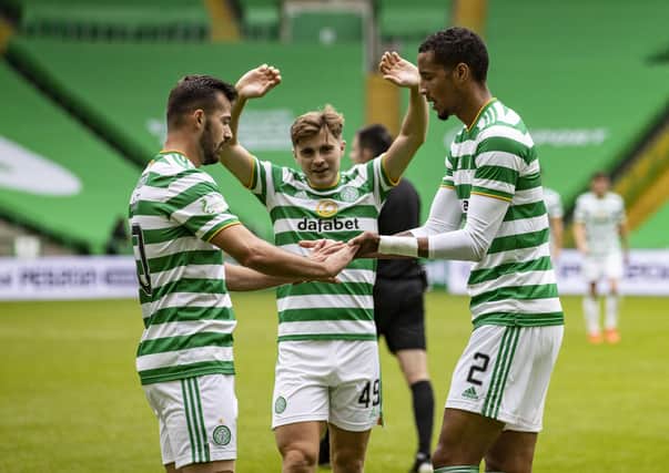 Left to right, Celtic scorers Albian Ajeti, James Forrest and Christopher Jullien celebrate. Picture: SNS