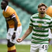 James Forrest celebrates scoring Celtic's opening goal against Motherwell. Picture: PA.