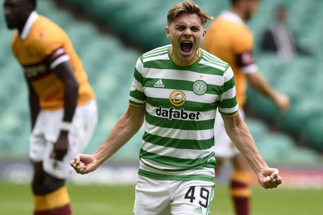 James Forrest celebrates scoring Celtic's opening goal against Motherwell. Picture: PA.