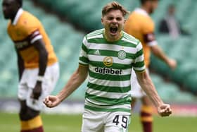 James Forrest celebrates scoring Celtic's opening goal against Motherwell. Picture: PA.