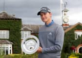 Rasmus Hojgaard shows off his trophy following his victory in the ISPS Handa UK Championship at The Belfry yesterday. Picture: PA.