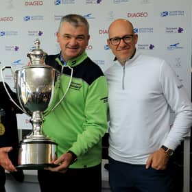 Paul Lawrie, flanked by John McMillan, provost of East Lothian, left, and Ryan Howson, after the Scot had won the Scottish Senior Open at Craigielaw Golf Club last year. Picture: Getty