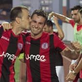 Roy Chipolina plants a kiss on Lee Casciaro after the veteran’s goal back in 2016 gave Lincoln Red Imps a famous 1-0 victory over Celtic. Picture: Craig Foy/SNS