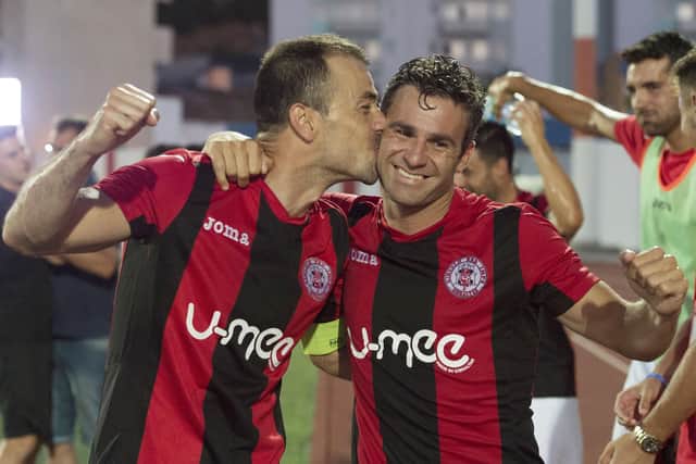 Roy Chipolina plants a kiss on Lee Casciaro after the veteran’s goal back in 2016 gave Lincoln Red Imps a famous 1-0 victory over Celtic. Picture: Craig Foy/SNS