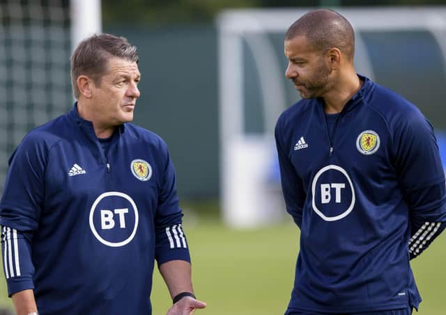 John Carver, left, with fellow coach Steven Reid at Scotland training