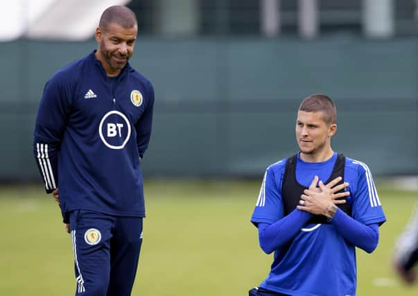 Scotland coach Steven Reid and striker Lyndon Dykes during a training session at the Oriam. Picture: Craig Williamson/SNS