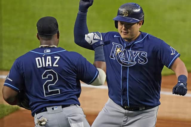 Tampa Bay Rays’ Ji-Man Choi, right, celebrates after hitting a two-run home run during his team’s 5-3 victory over the New York Yankees on Monday. Picture: AP.