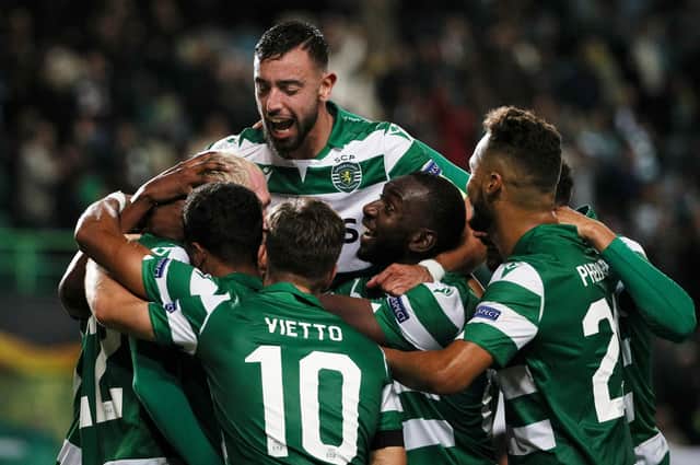 Sporting Lisbon players celebrate during their 4-0 Europa League group win over PSV last November. Picture: Filipe Amorim/AFP via Getty Images