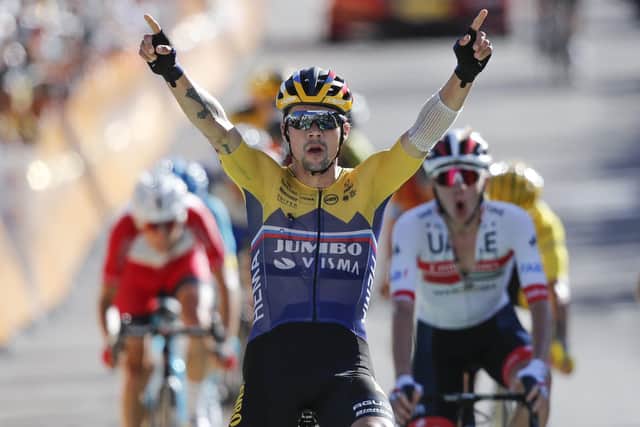 Team Jumbo-Visma’s Primoz Roglic crosses the line in triumph to win stage four in Orcieres-Merlette. Picture: Christophe Ena/AP