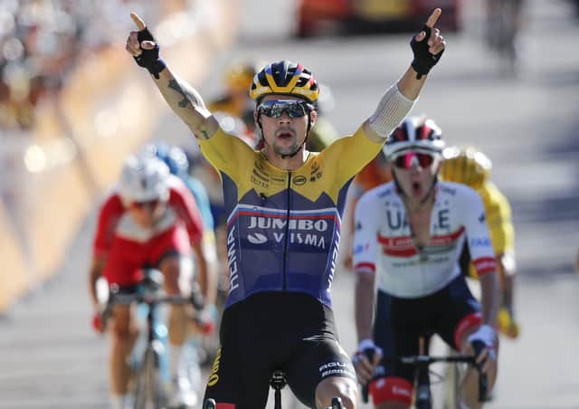 Team Jumbo-Visma’s Primoz Roglic crosses the line in triumph to win stage four in Orcieres-Merlette. Picture: Christophe Ena/AP