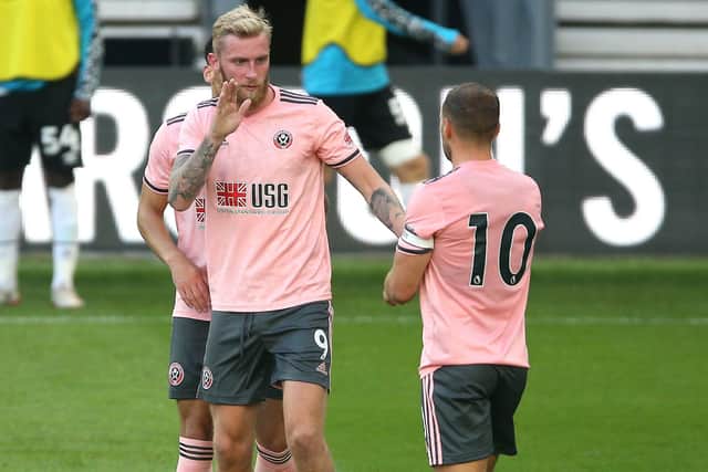 Oli McBurnie, left, during Sheffield United's pre-season friendly against Derby at Pride Park on Tueday night. Picture: Nigel French/PA Wire