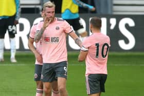 Oli McBurnie, left, during Sheffield United's pre-season friendly against Derby at Pride Park on Tueday night. Picture: Nigel French/PA Wire