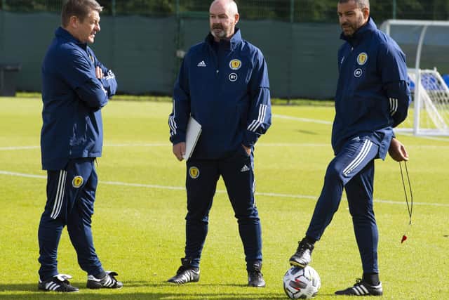 Scotland manager Steve Clarke, centre, with assistants John Carver, left, a recent addition to his coaching team, and Steven Reid. Picture: Alan Harvey / SNS