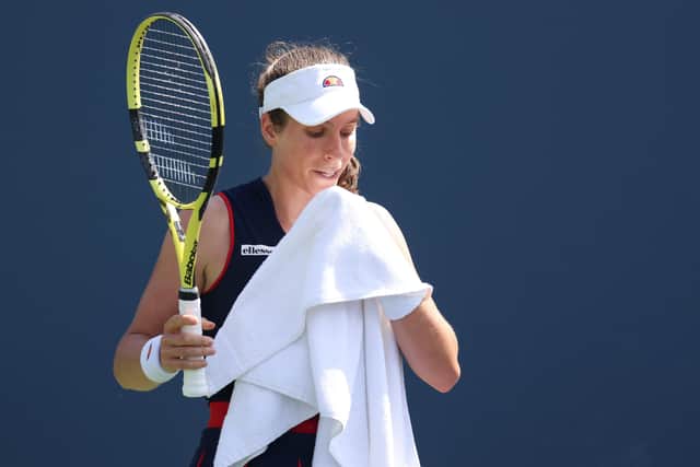 A moment of contemplation for Johanna Konta as she heads for her second-round defeat. Picture: Getty