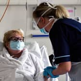 Senior staff nurse Donna Read treats a patient at Forth Valley Royal Hospital in Larbert. Picture: Michael Gillen