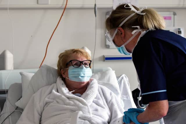 Senior staff nurse Donna Read treats a patient at Forth Valley Royal Hospital in Larbert. Picture: Michael Gillen