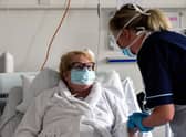 Senior staff nurse Donna Read treats a patient at Forth Valley Royal Hospital in Larbert. Picture: Michael Gillen
