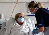 Senior staff nurse Donna Read treats a patient at Forth Valley Royal Hospital in Larbert. Picture: Michael Gillen