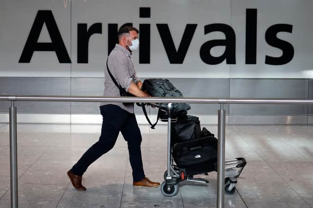 Travellers arriving from overseas must check if they need to go into quarantine (Picture: Tolga Akmen/AFP via Getty Images)