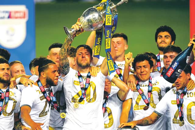 As captain of Leeds United, Liam Cooper lifts the Championship trophy. Picture: Michael Regan/Getty Images