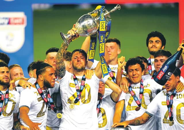 As captain of Leeds United, Liam Cooper lifts the Championship trophy. Picture: Michael Regan/Getty Images