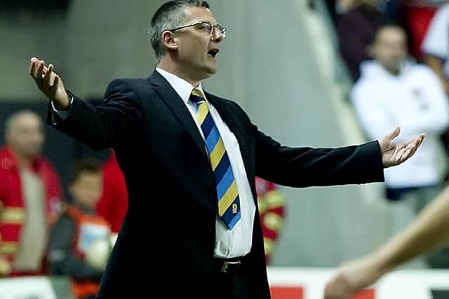 Craig Levein cuts a frustrated figure during the European Championship qualifier against Czech Republic ten years ago. Picture: Alan Harvey/SNS