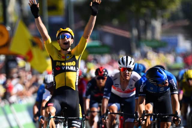 Belgium's Wout van Aert celebrates as he crosses the finish line. Picture: Stuart Franklin/Getty