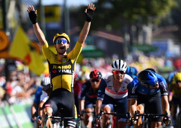 Belgium's Wout van Aert celebrates as he crosses the finish line. Picture: Stuart Franklin/Getty