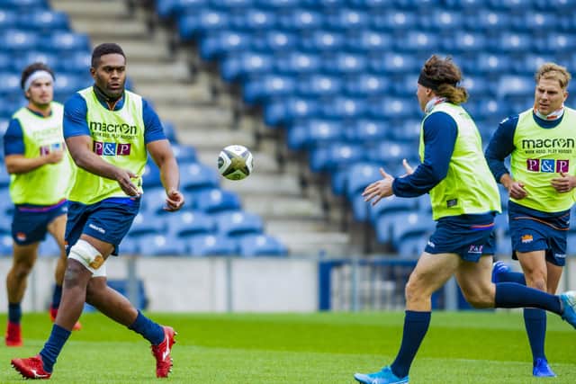 Bill Mata passes to Hamish Watson during an Edinburgh training session ahead of the Pro14 semi-final. Picture: Mark Scates/SNS