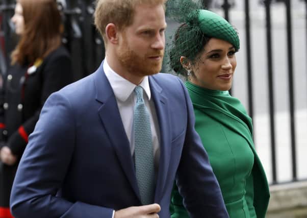 Britain's Harry and Meghan, the Duke and Duchess of Sussex, arrive to attend the annual Commonwealth Day service at Westminster Abbey in London. Picture: AP Photo/Kirsty Wigglesworth