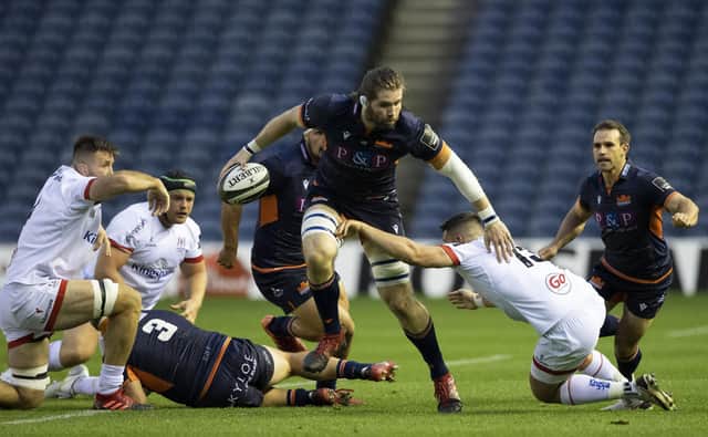 Ben Toolis attempts to escape the attentions of Ulster's James Hume. Picture: Craig Williamson/SNS
