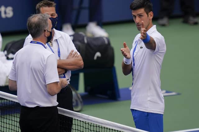 Novak Djokovic pleads his case after the incident. Picture: Seth Wenig/AP