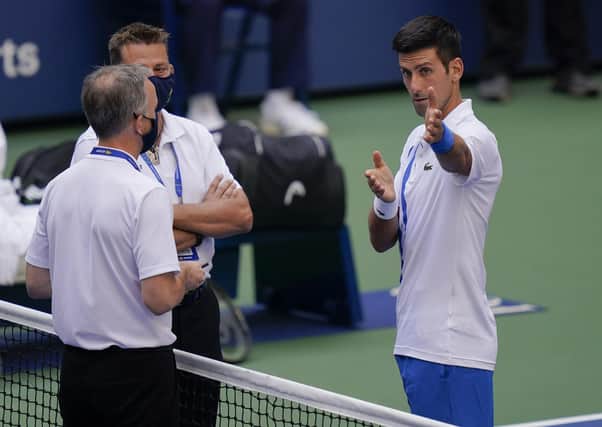 Novak Djokovic pleads his case after the incident. Picture: Seth Wenig/AP