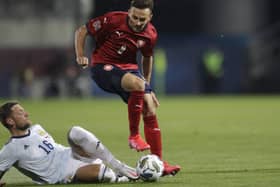 Scotland defender Liam Cooper slides in on Adam Karabec. Picture: Petr David/AP