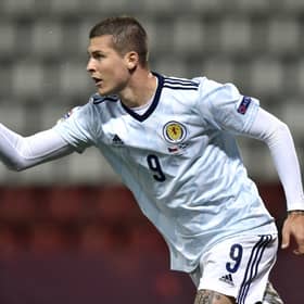 Lyndon Dykes celebrates scoring Scotland's first goal. Picture: Radek Petrasek/PA Wire